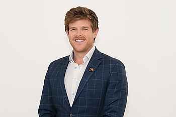 Portrait of Tyler Marrin, VP of Marketing